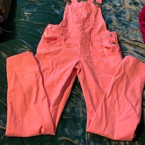 Pink denim overalls